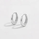 Pure Shine Huggie Earrings — 925 Sterling Silver | Elegant Jewelry by Drop Charm