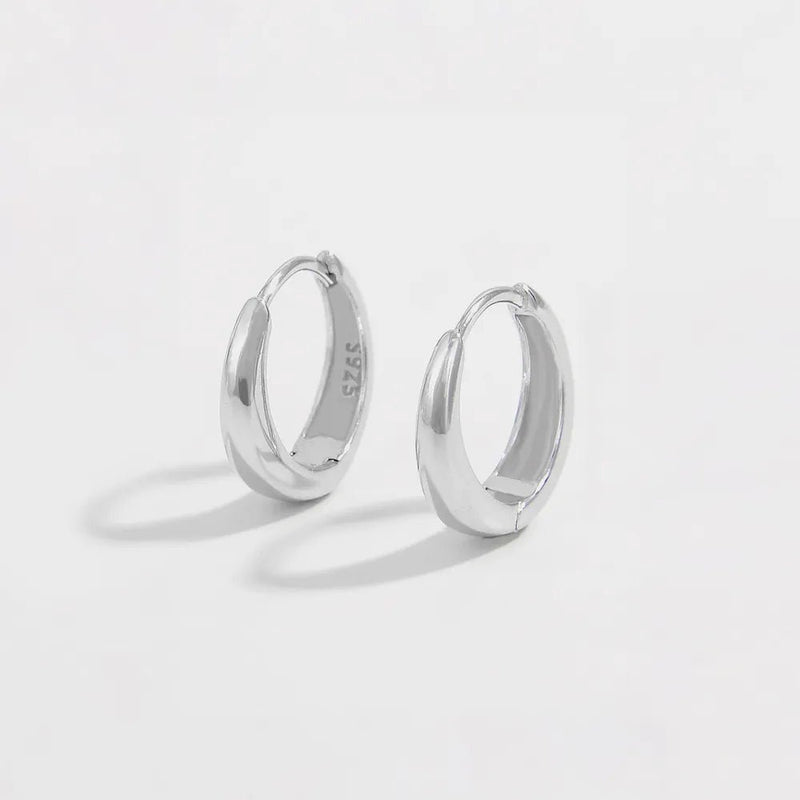 Pure Shine Huggie Earrings — 925 Sterling Silver | Elegant Jewelry by Drop Charm